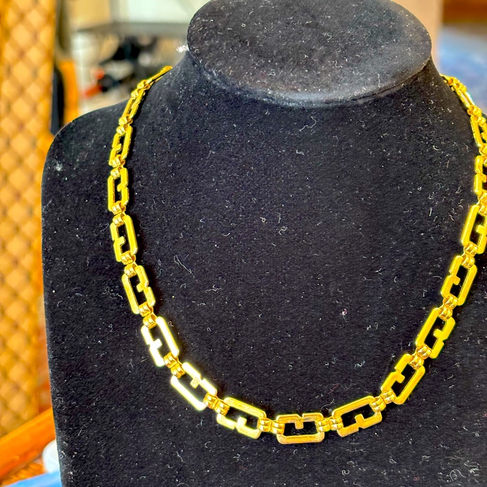 Beautiful vintage Givenchy “g” necklace . 17.75 inches long .
